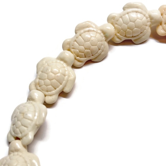 As Low As $2 White Synthetic Turquoise Turtle Beads 22mm x 13mm (8) - Picture 1 of 2